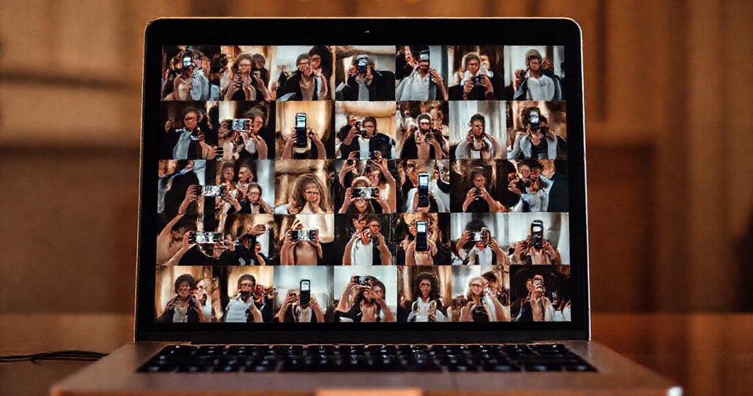 The collected guest photos reviewed on a laptop