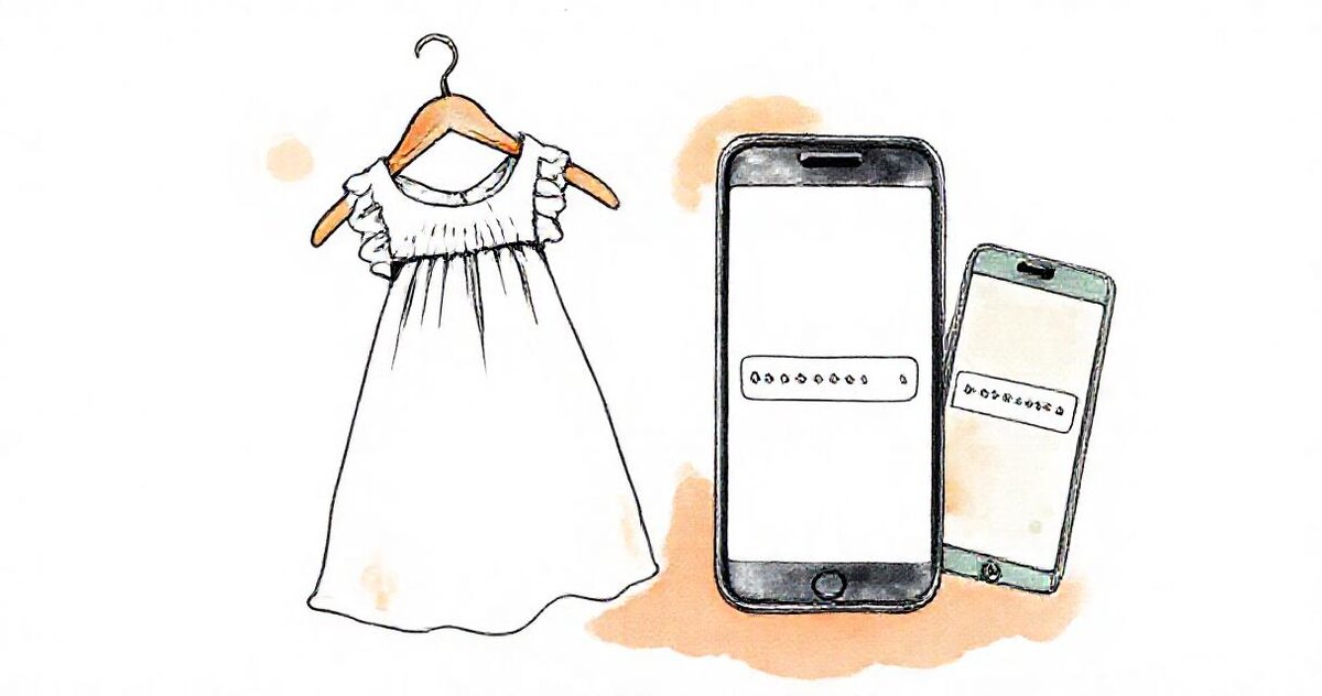 A small white christening gown on a hanger beside two phones showing a password field